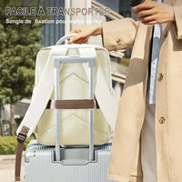 Sac de voyage cabine fixé sur une valise à roulettes