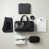 Capacité de rangement du sac de voyage homme en simili cuir