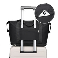 Sac de voyage femme extensible 36L fixé sur une valise