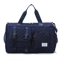 Sac de voyage femme cabas à boucles, coloris bleu foncé