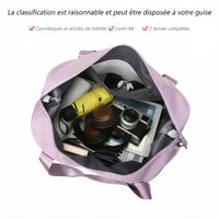 Sac de voyage femme extensible rempli d'affaires