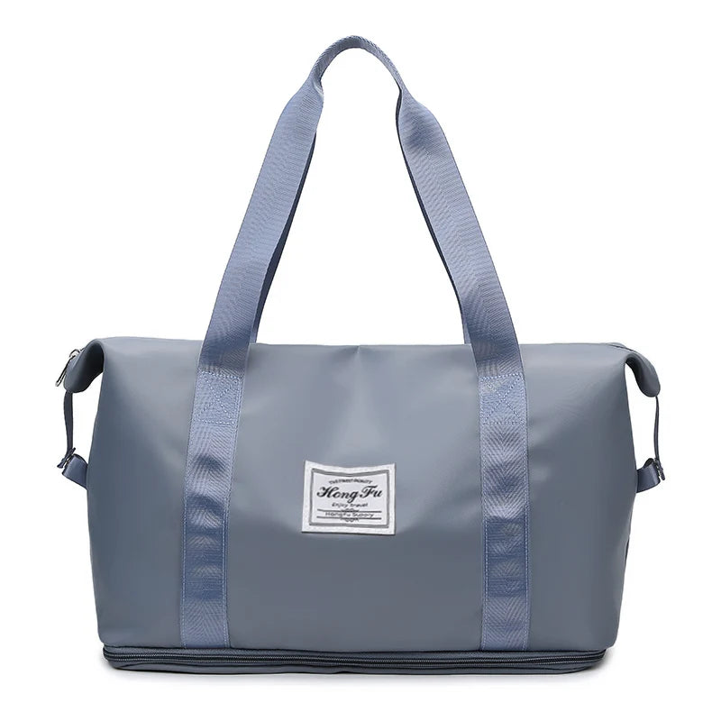 Sac de voyage femme extensible 31L, coloris bleu