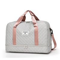 Sac de voyage femme matelassé, coloris gris rose