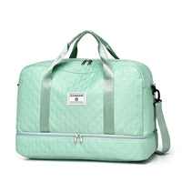 Sac de voyage femme matelassé, coloris vert, vue de face