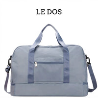 Poche arrière zippée du sac de voyage femme week-end