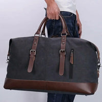Sac de voyage homme en toile, porté à la main