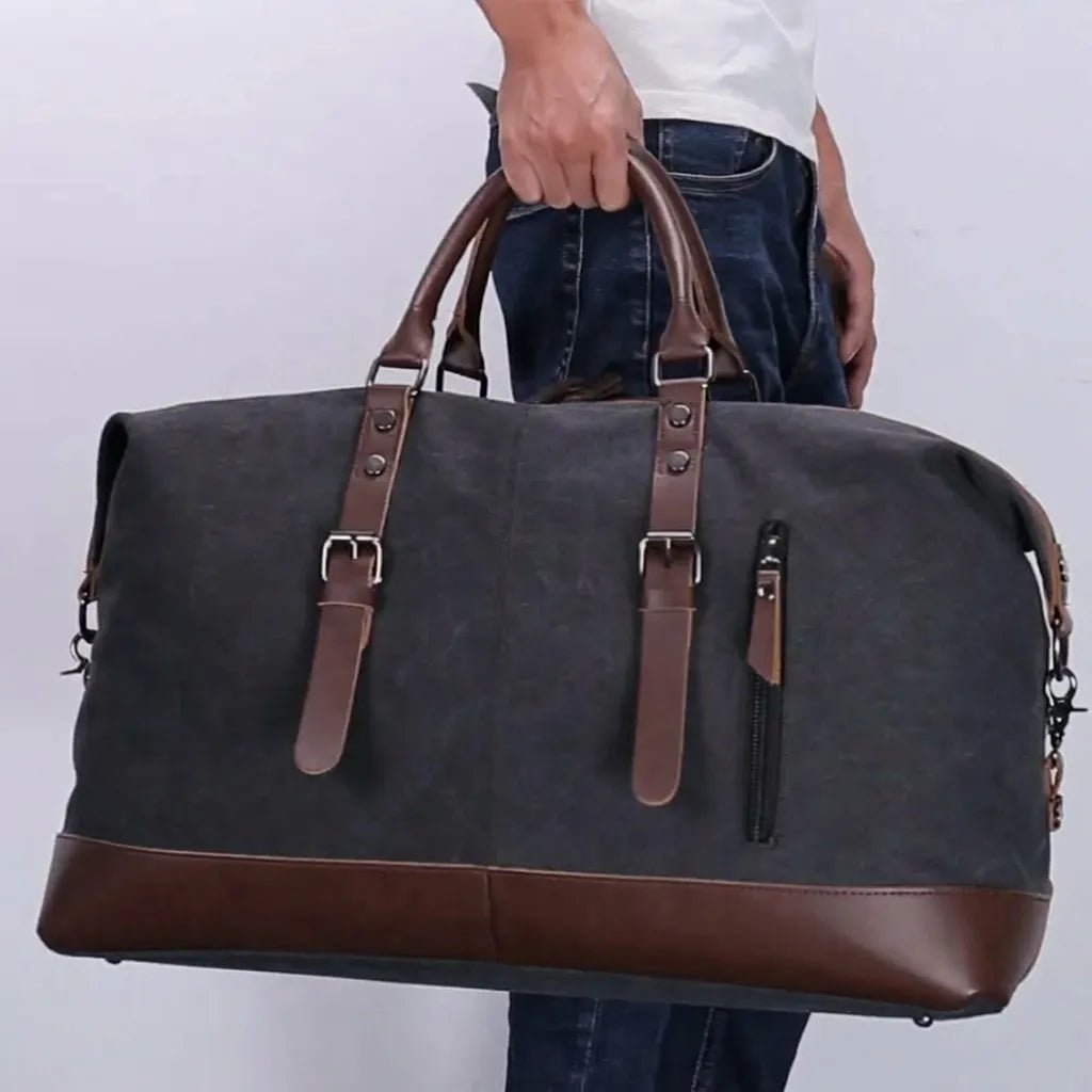 Sac de voyage homme en toile, porté à la main
